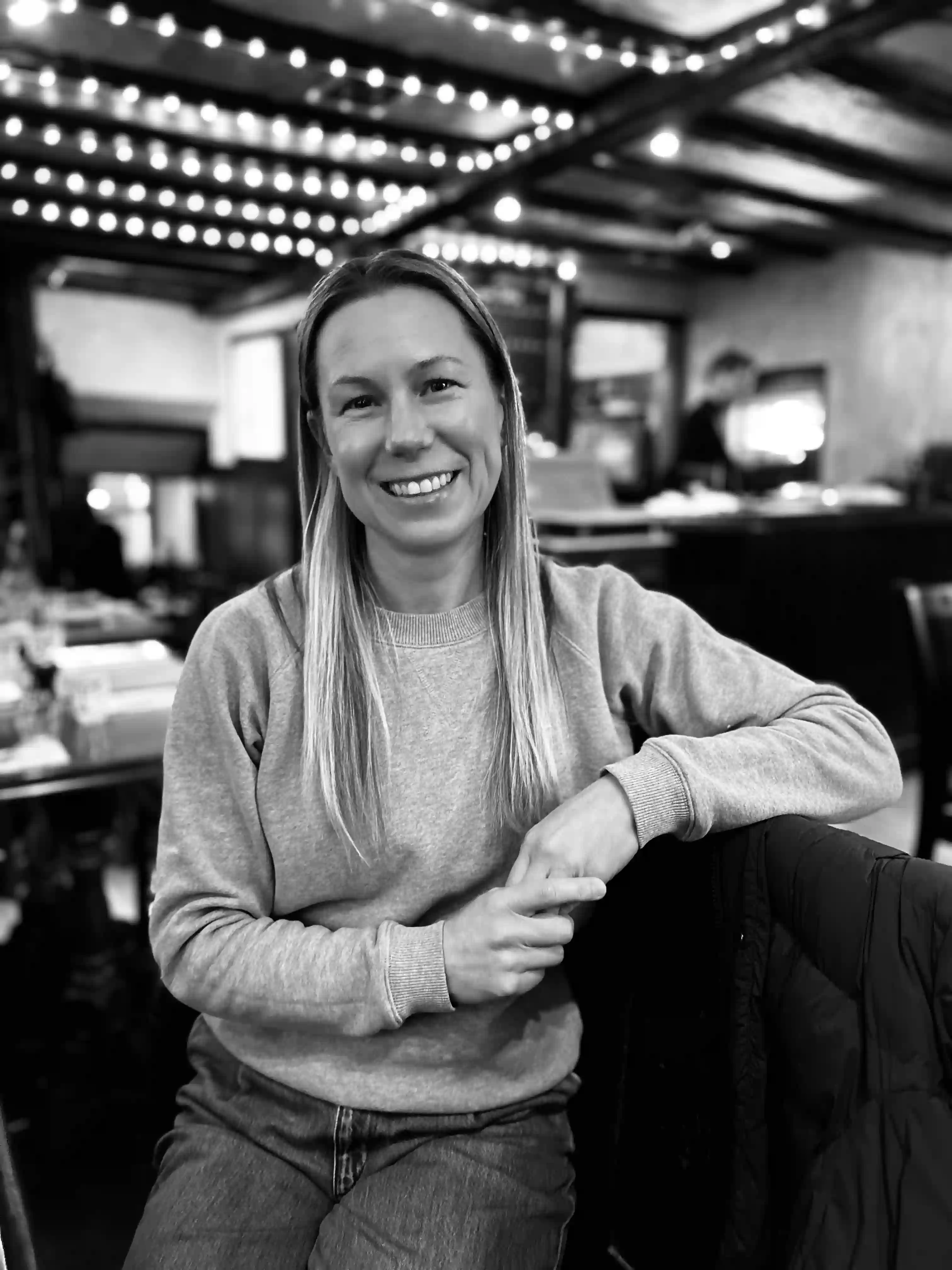 Comfortable chair with monstera plant